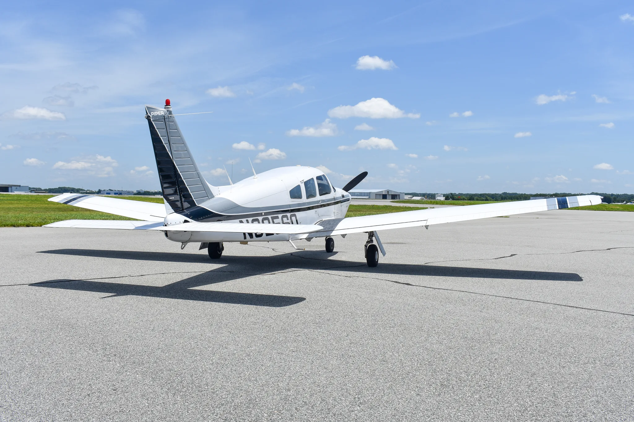 Exterior view of a 1977 Piper Turbo Arrow, N3256Q.