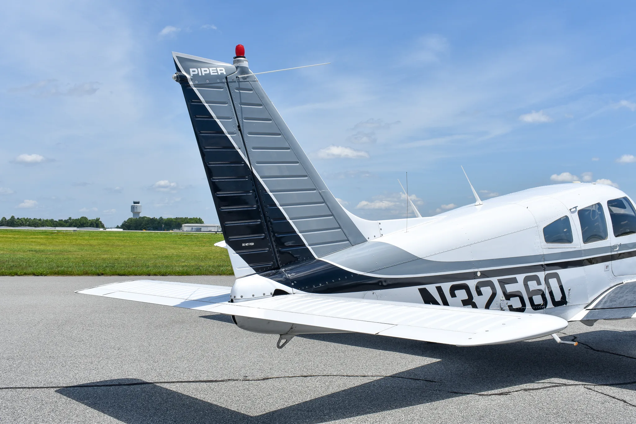 Exterior view of a 1977 Piper Turbo Arrow, N3256Q.