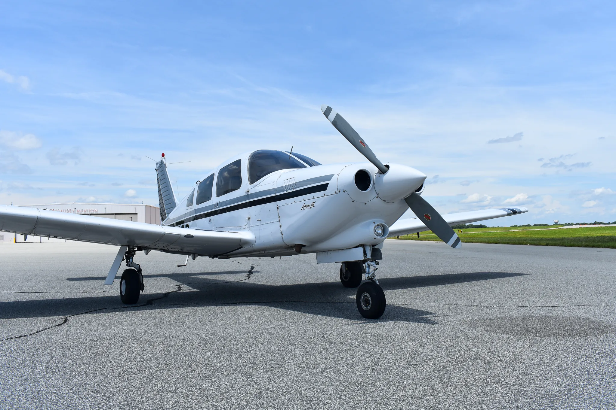 Exterior view of a 1977 Piper Turbo Arrow, N3256Q.