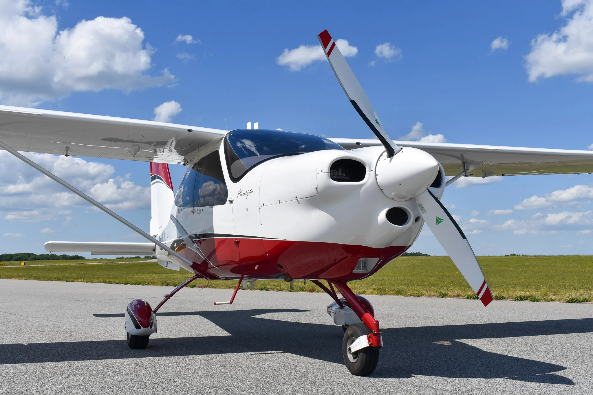 Exterior view of a 2016 Tecnam P2010, N228TA.