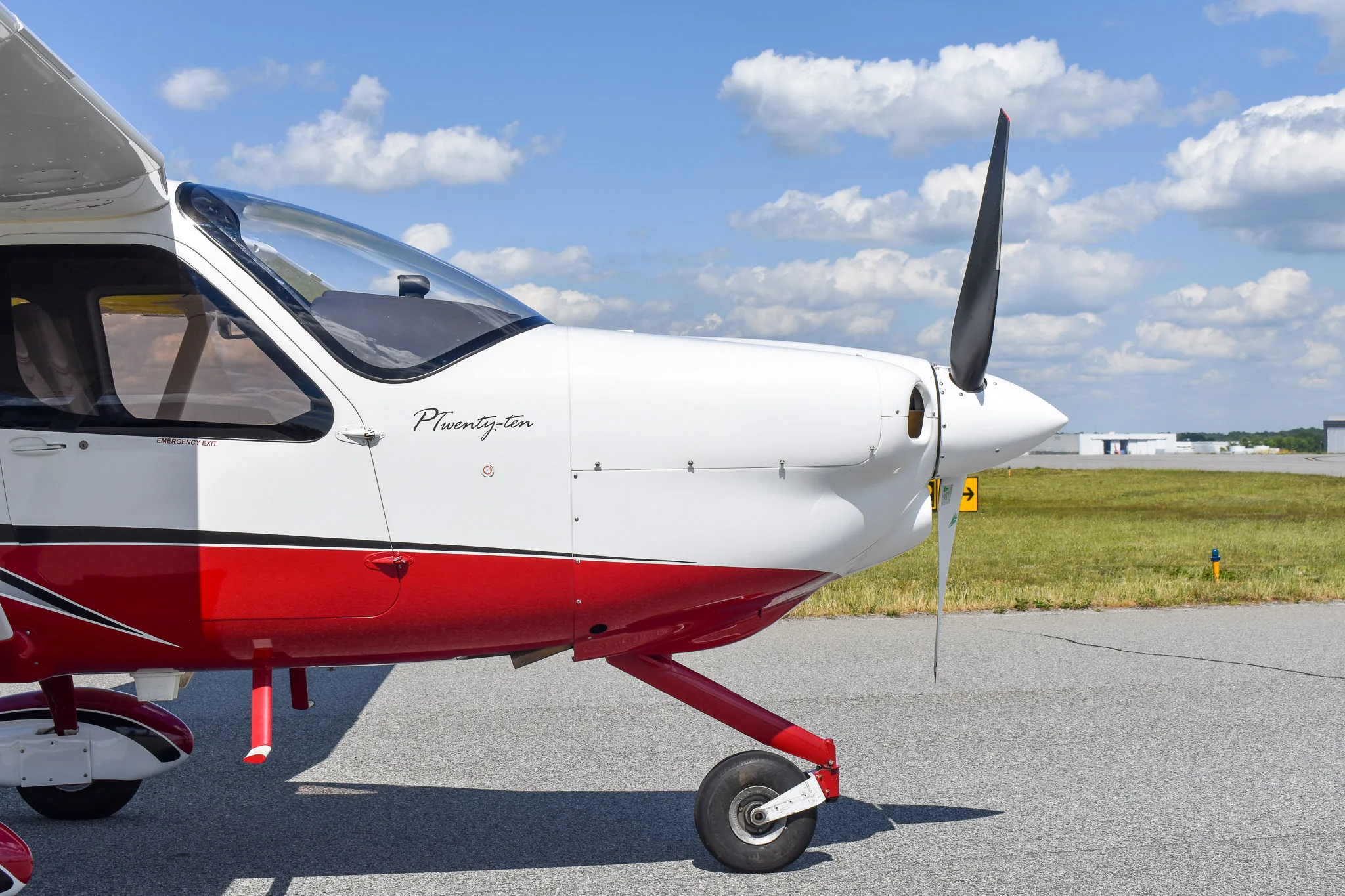 Exterior view of a 2016 Tecnam P2010, N228TA.