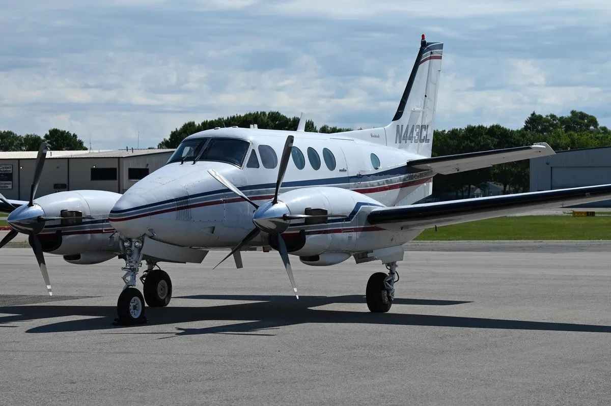 Exterior view of a 1979 Beechcraft King Air E90 SN, N443CL.