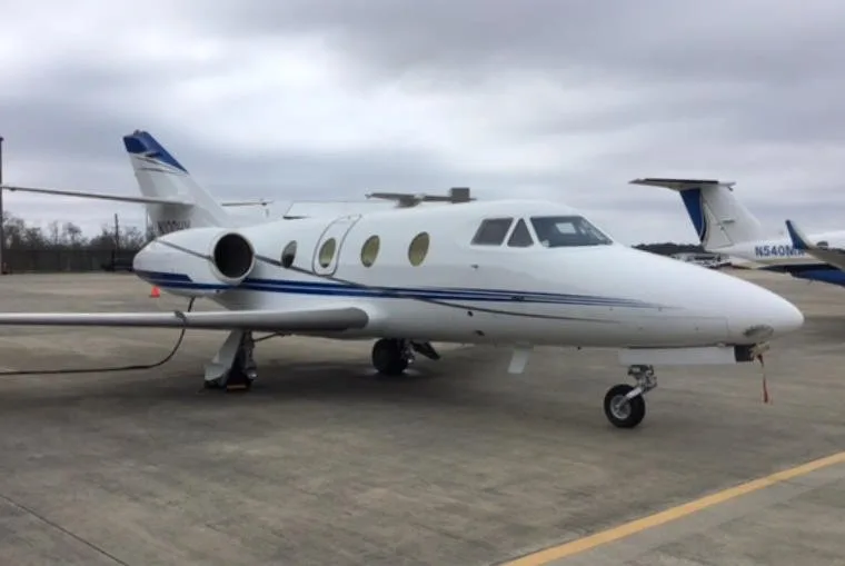 Exterior view of a 1981 Dassault Falcon 100 SN 183, N100KU.