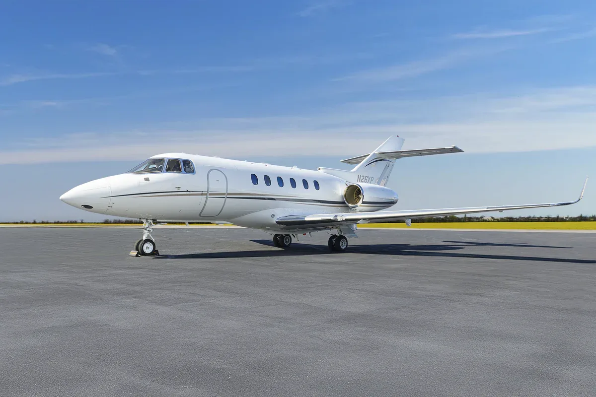 Exterior view of a 2010 Hawker 900XP SN, N26XP.