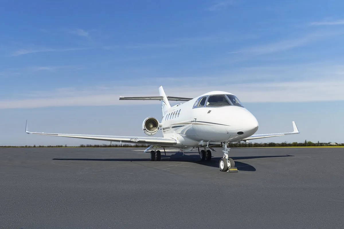 Exterior view of a 2010 Hawker 900XP SN, N26XP.