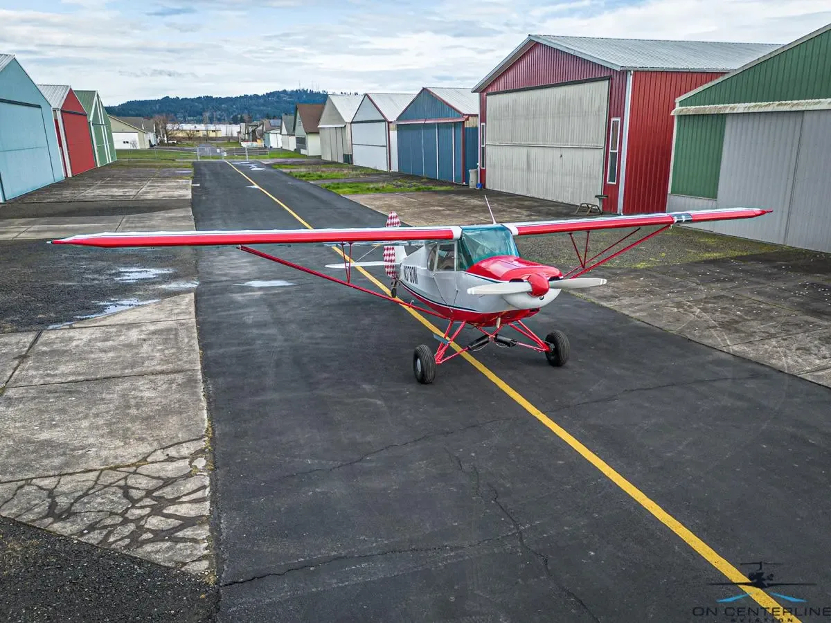 Exterior view of a 1947 Piper PA-12 Super Cruiser –, N3780M.