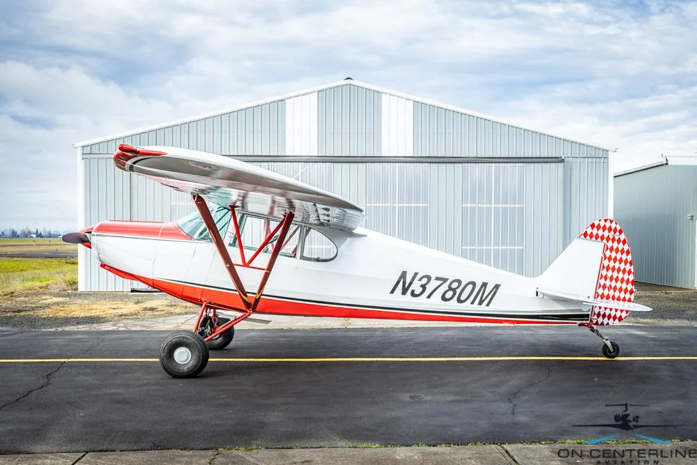 Exterior view of a 1947 Piper PA-12 Super Cruiser –, N3780M.