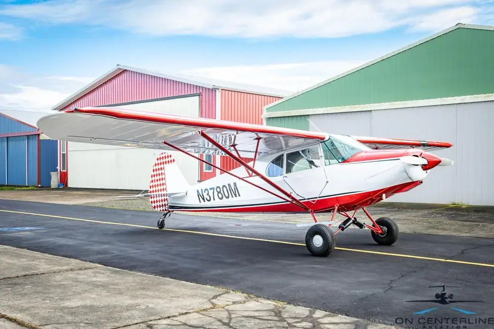 Exterior view of a 1947 Piper PA-12 Super Cruiser –, N3780M.