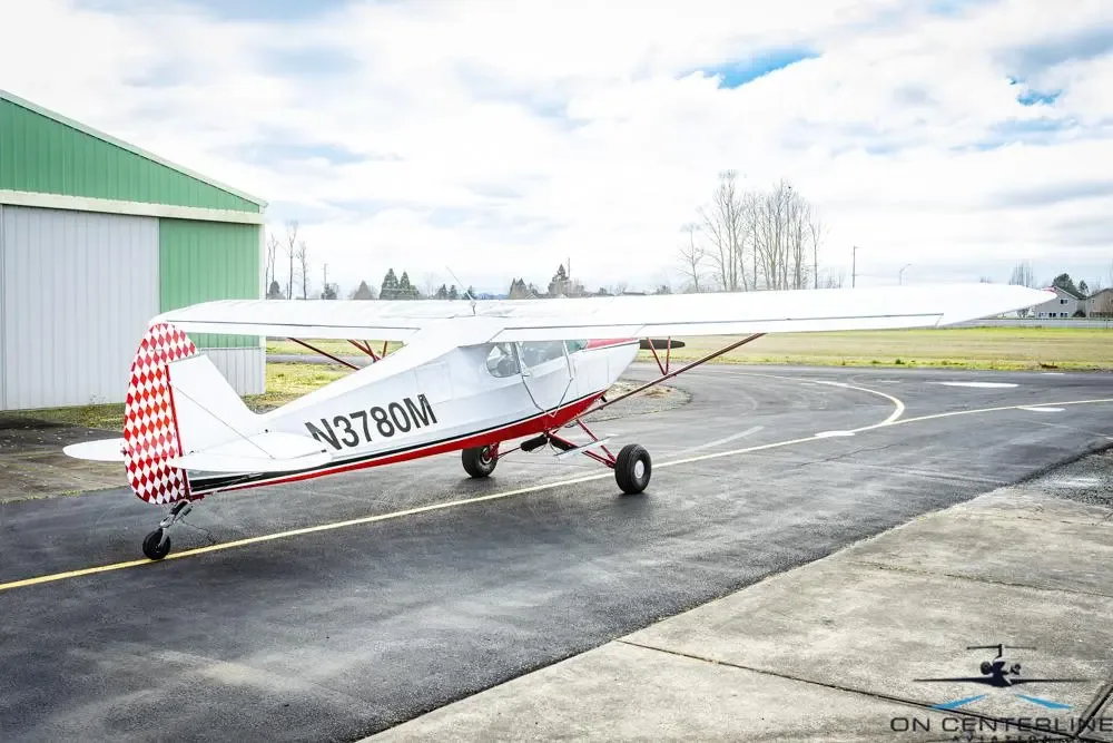 Exterior view of a 1947 Piper PA-12 Super Cruiser –, N3780M.