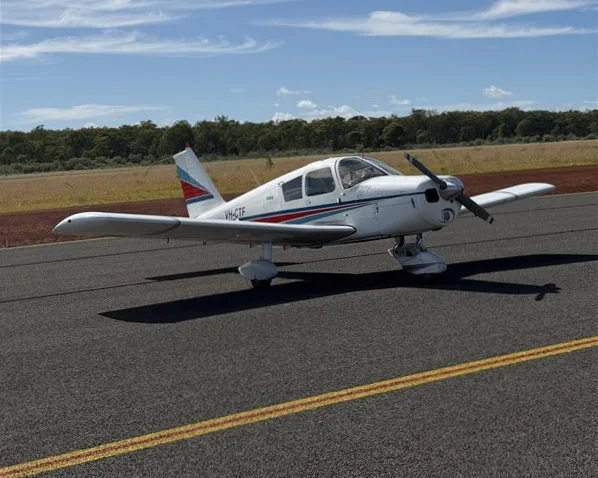 Exterior view of a 1961 Piper Comanche 180, VH-FFE.