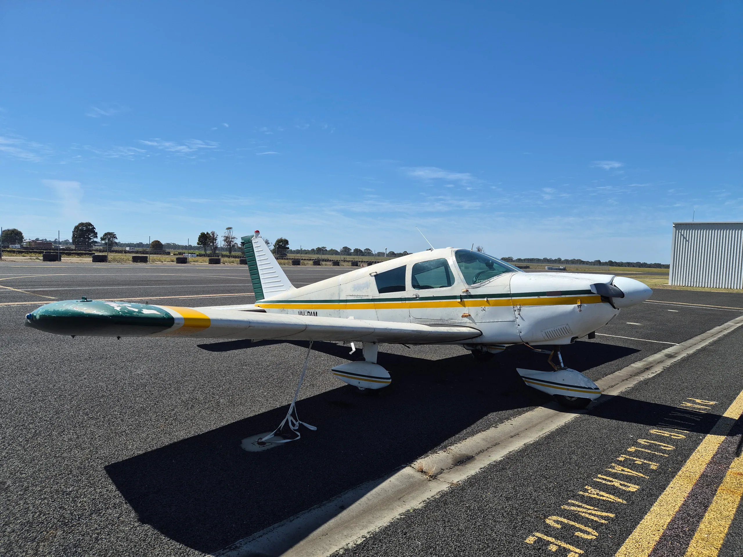 Exterior view of a 1963 Piper Cherokee 180 B, ZK-SNE.