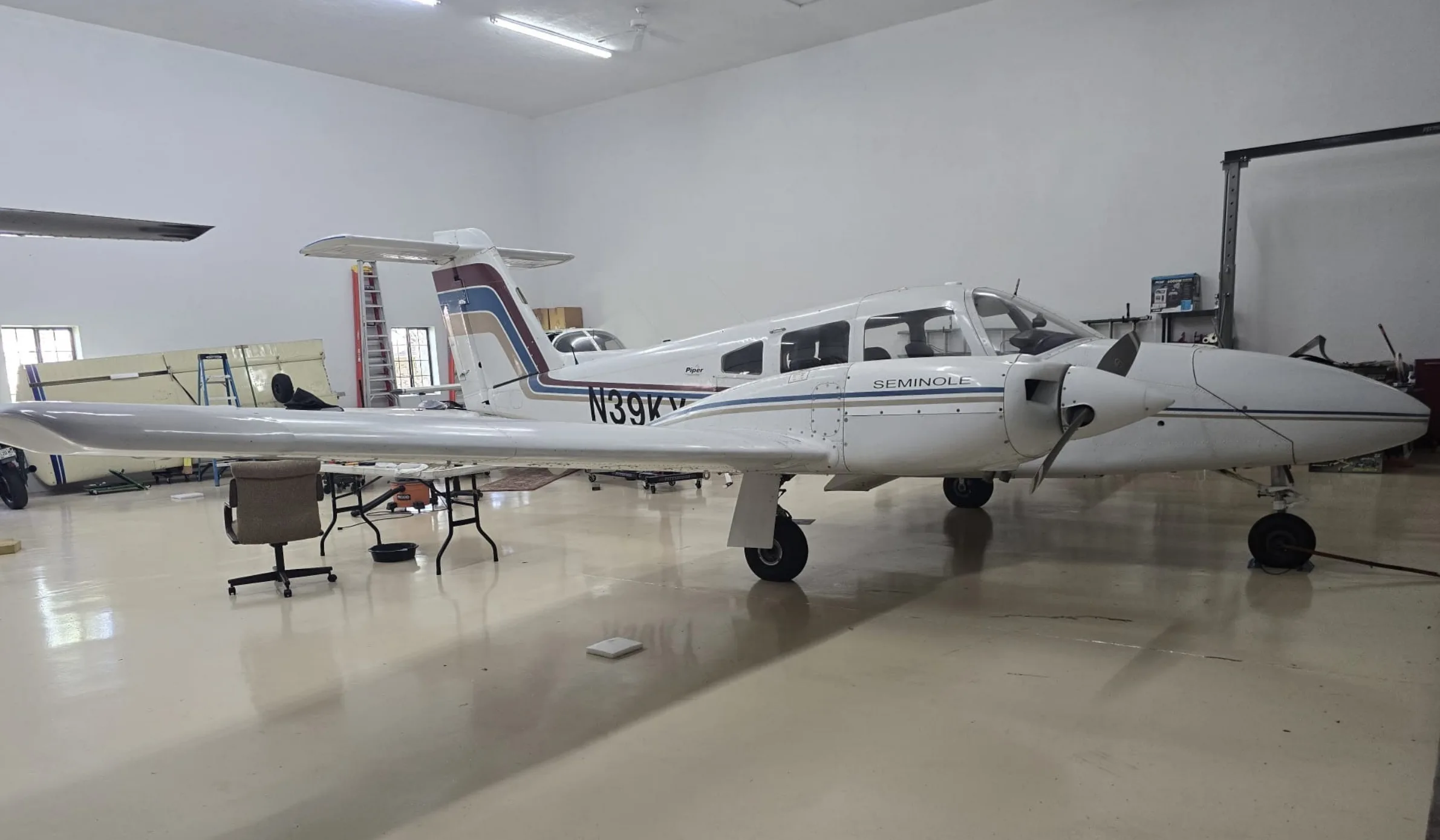 Exterior view of a 1971 Piper Seminole, VH-HMB.