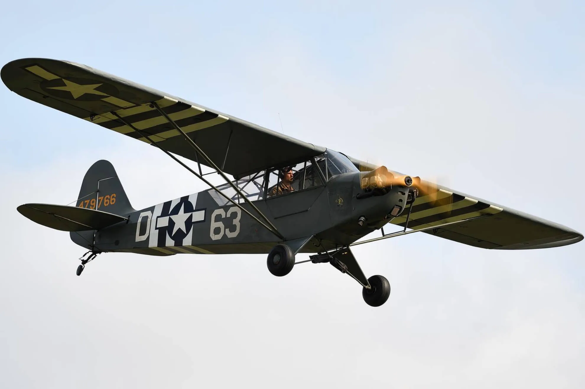 Marketing image of a 1944 Piper L-4H Grasshopper.