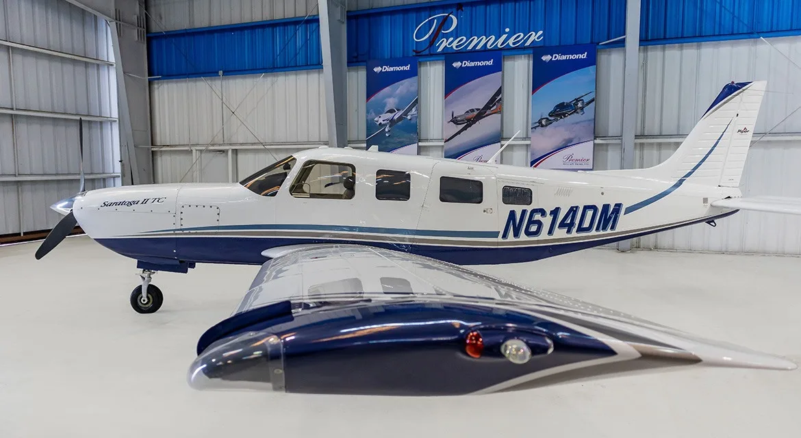 Exterior view of a 2006 Piper Saratoga II TC, N614DM.