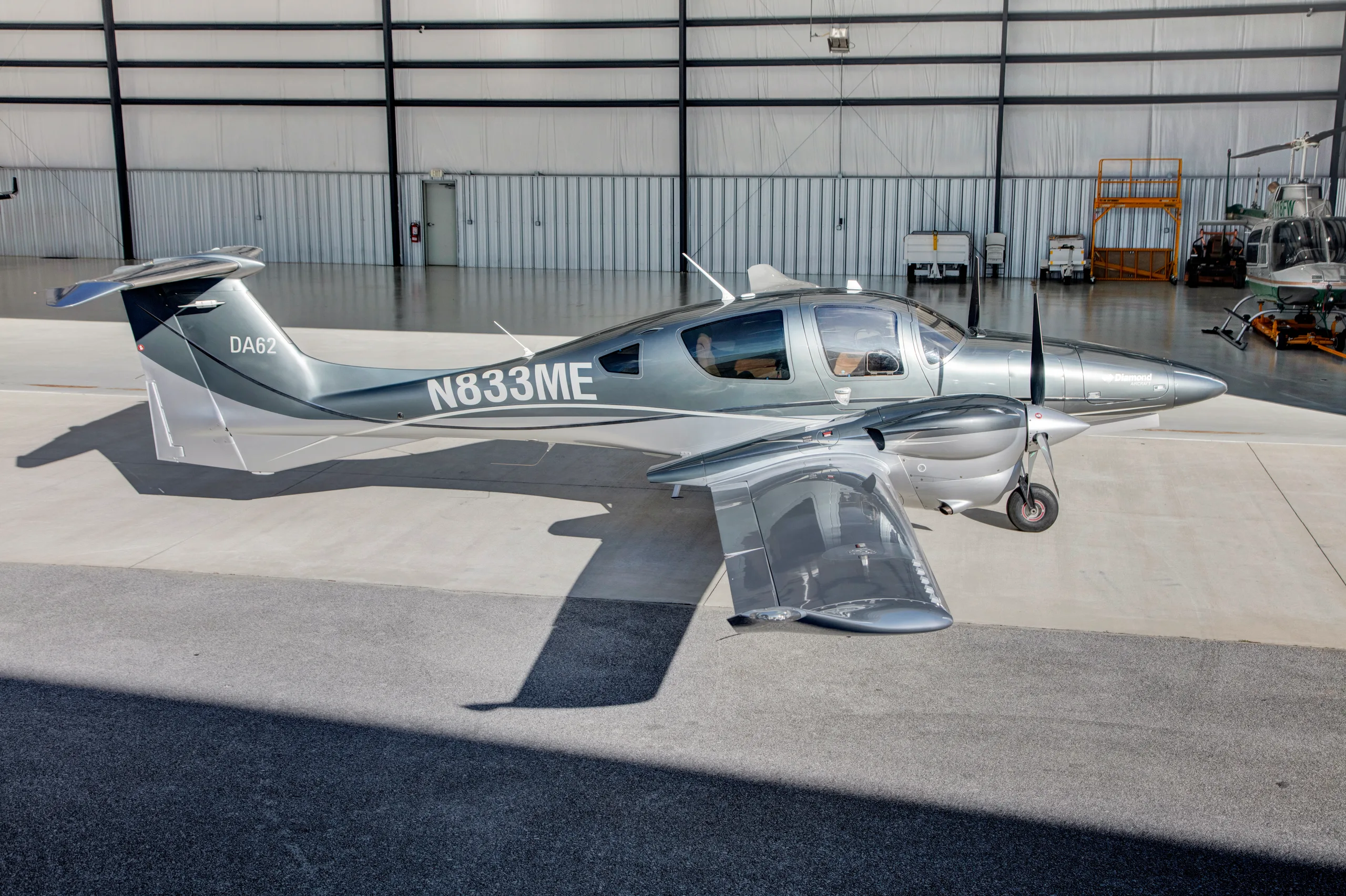 Exterior view of a 2016 Diamond DA62, N833ME.