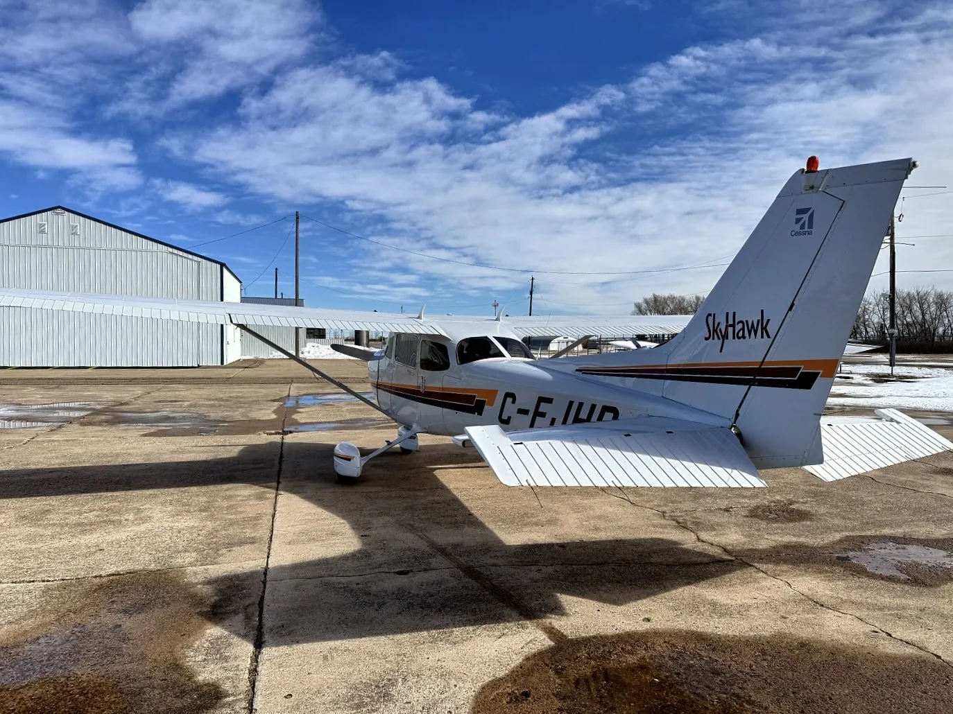 Exterior view of a 2001 Cessna 172R, N64JA.