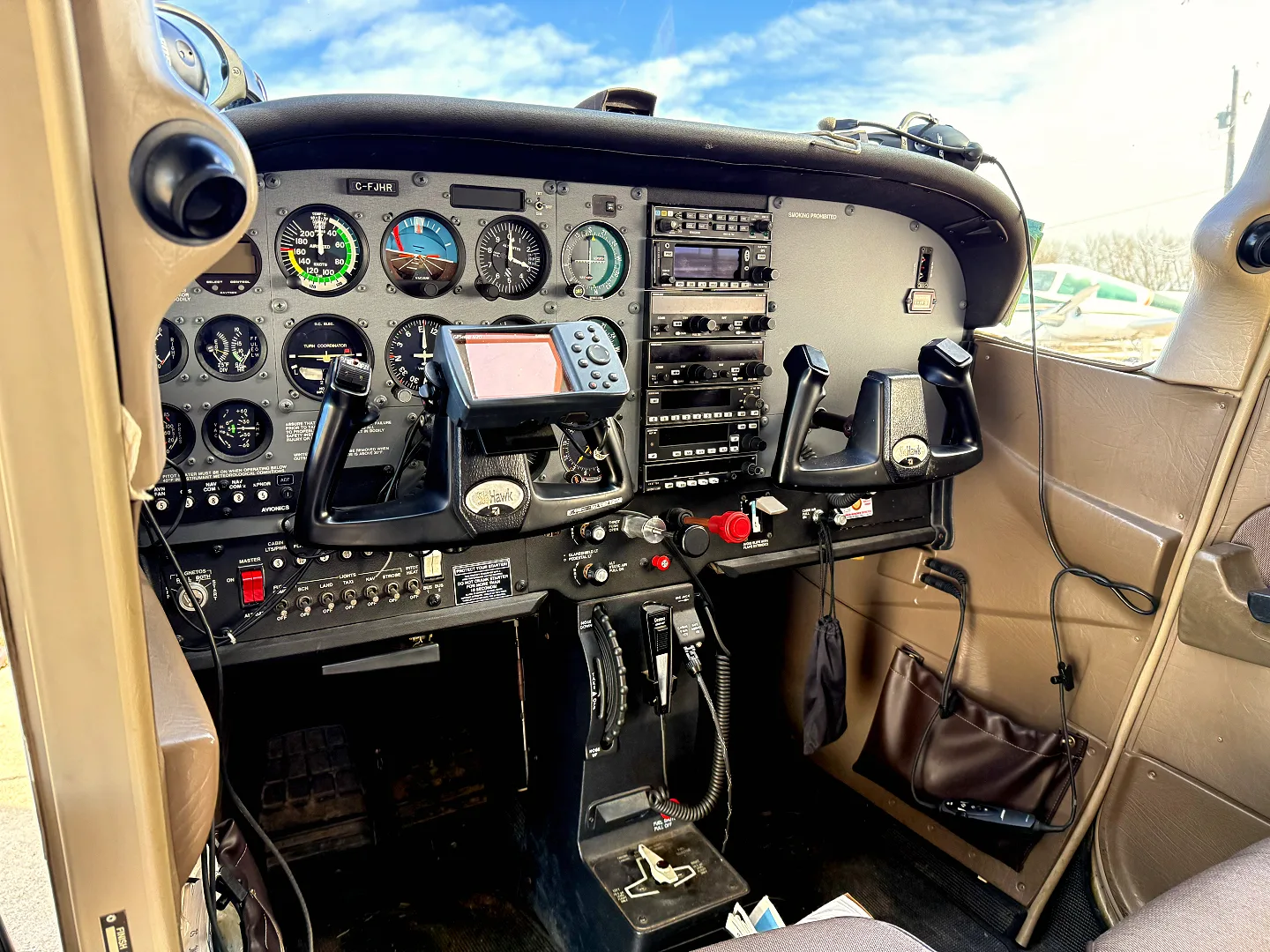 Cockpit and instrument panel of a 2001 Cessna 172R.