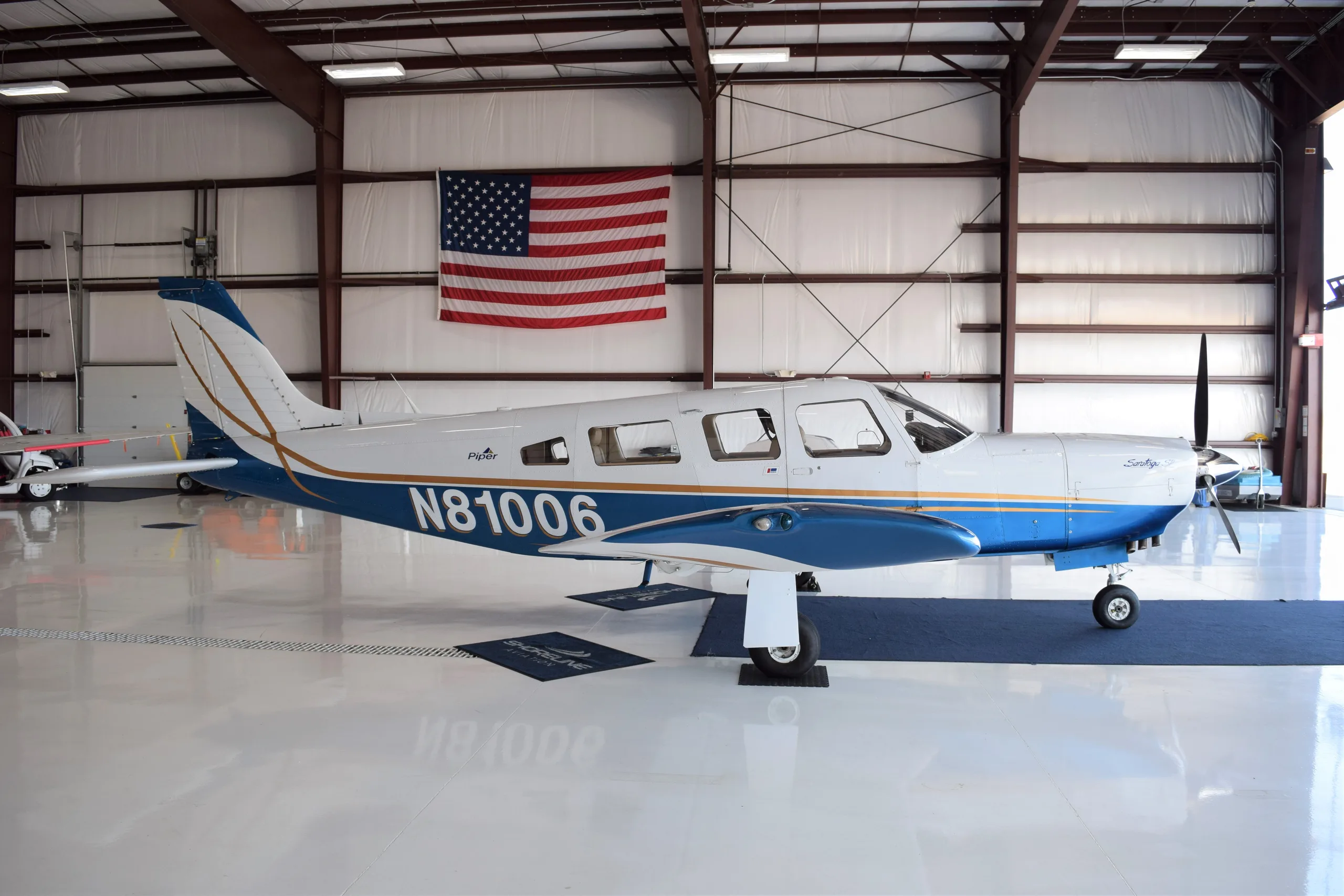 Exterior view of a Piper saratoga sp, N81006.