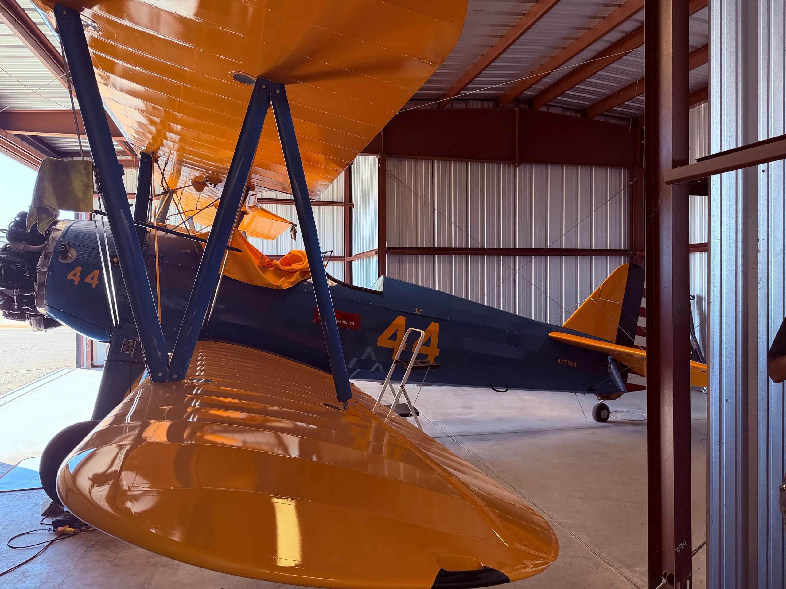 Exterior view of a 1941 Boeing Stearman and Classic Tug $149,000 (Local to Placerville), N77744.