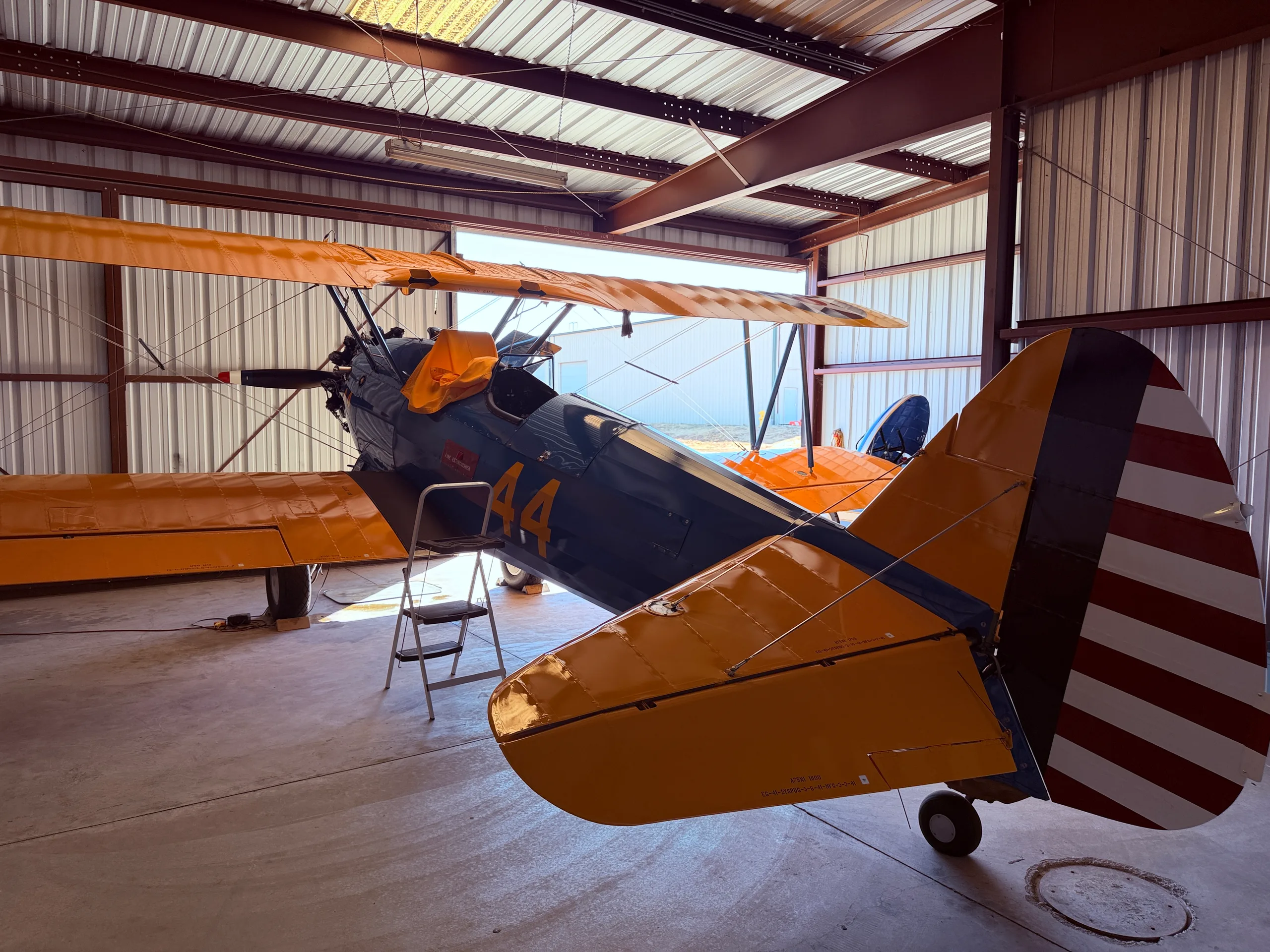 Exterior view of a 1941 Boeing Stearman and Classic Tug $149,000 (Local to Placerville), N77744.