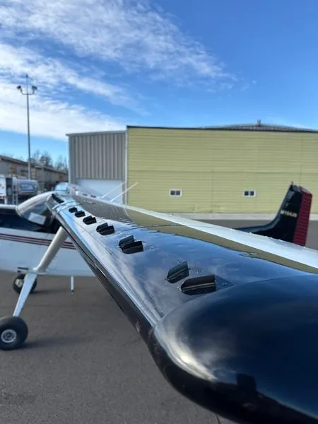 Exterior view of a 1967 Cessna 180 Skywagon (P-Ponk 470-50 engine) $250,000 - N164JD (Minnesota).