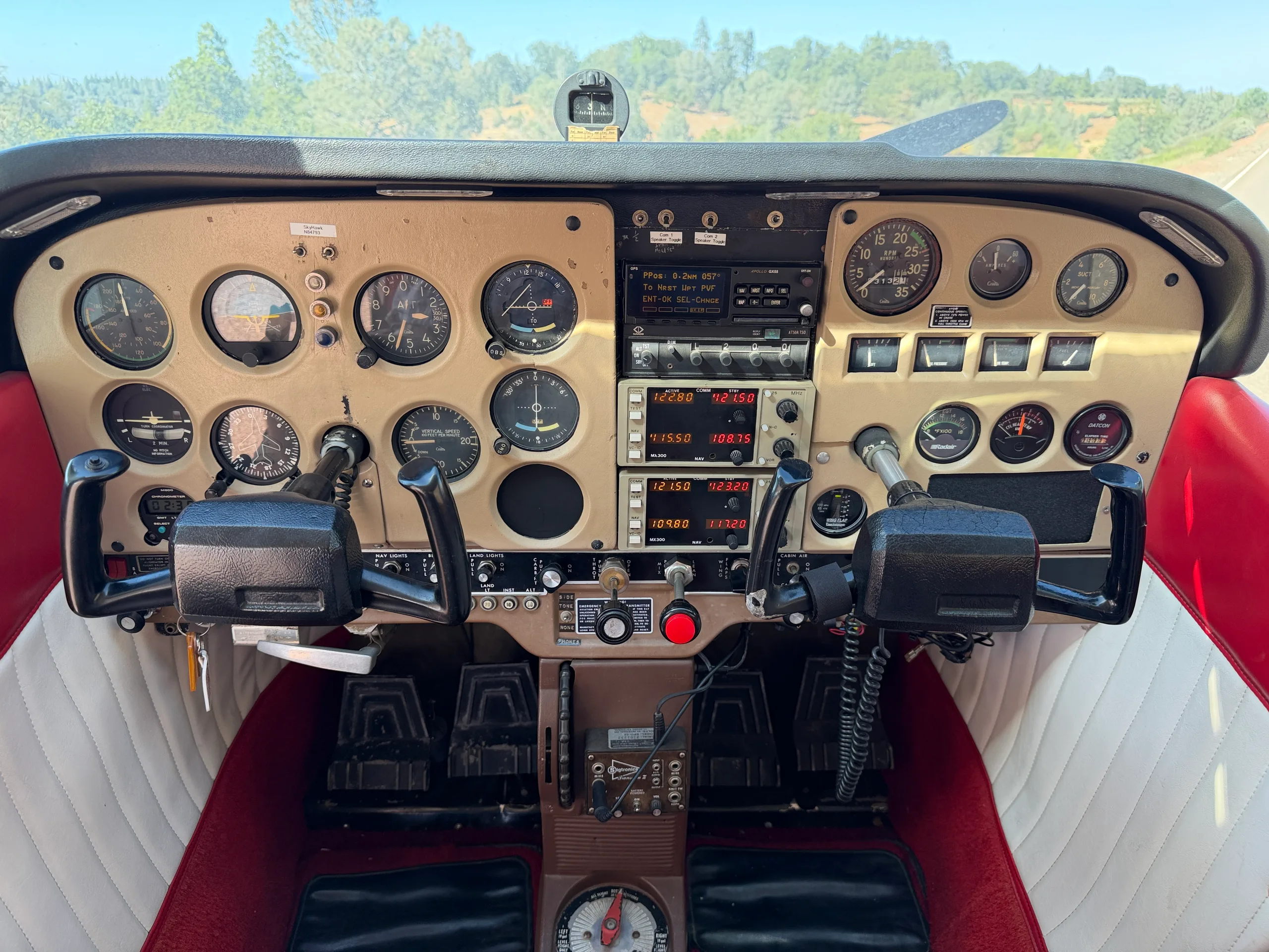 Cockpit and instrument panel of a 1969 Cessna 172K - $99,000 - N84793 (Here at Placerville).
