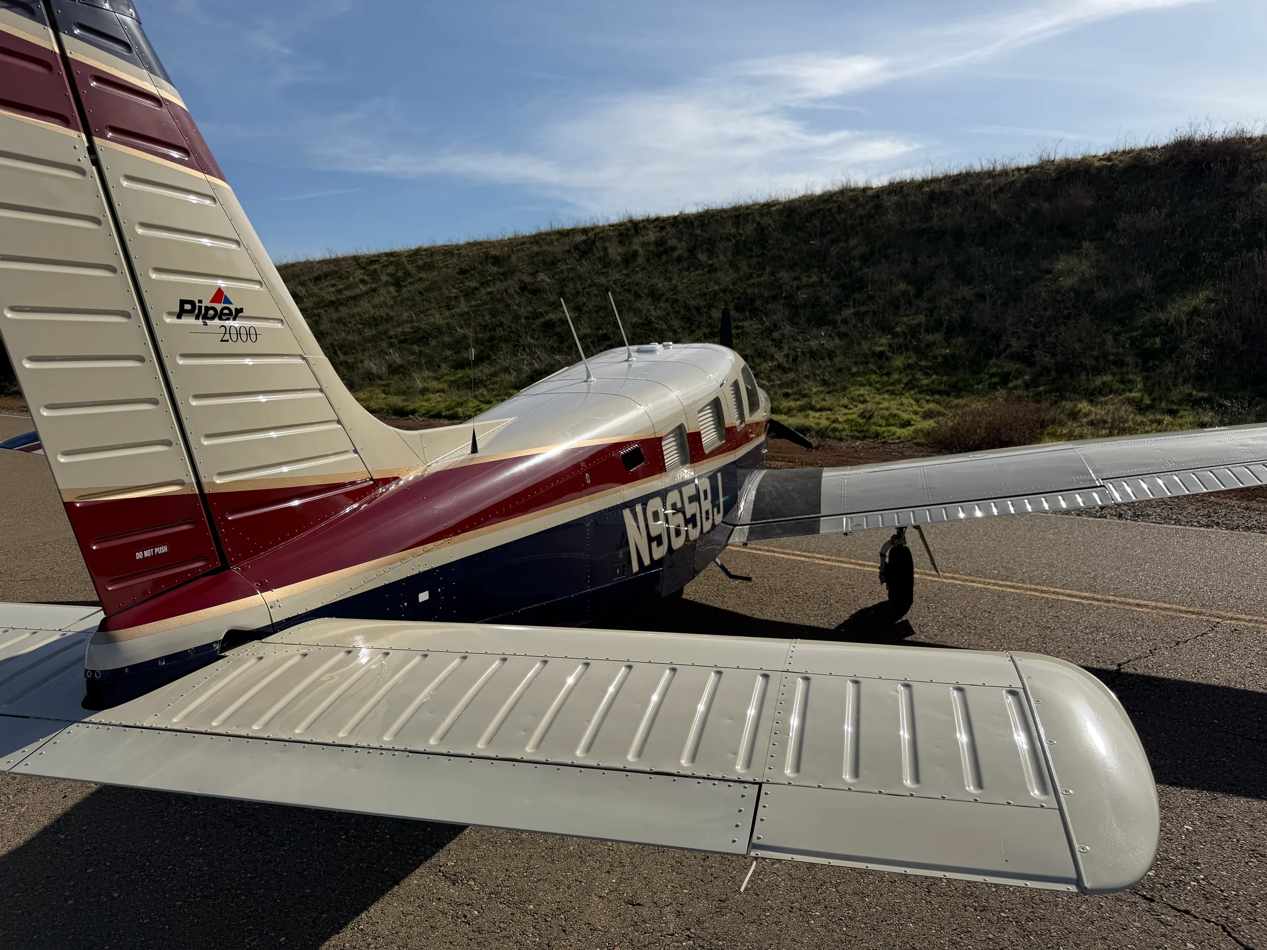 Exterior view of a 2000 Piper Turbo Saratoga II - $349,000 - N965BJ (Nevada), N8268M.