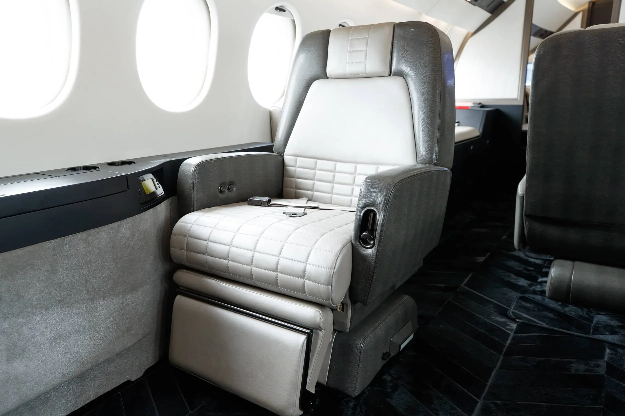 Cabin interior of a 2002 Dassault Falcon 900C — SmartJets.