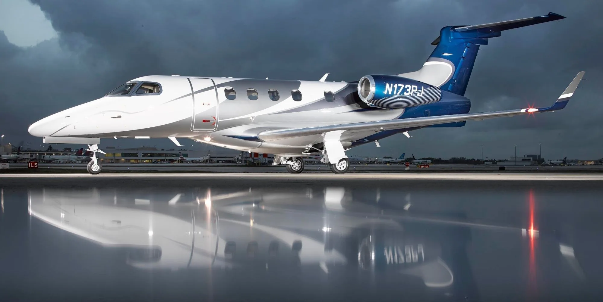 Exterior view of a 2013 Embraer Phenom 300.