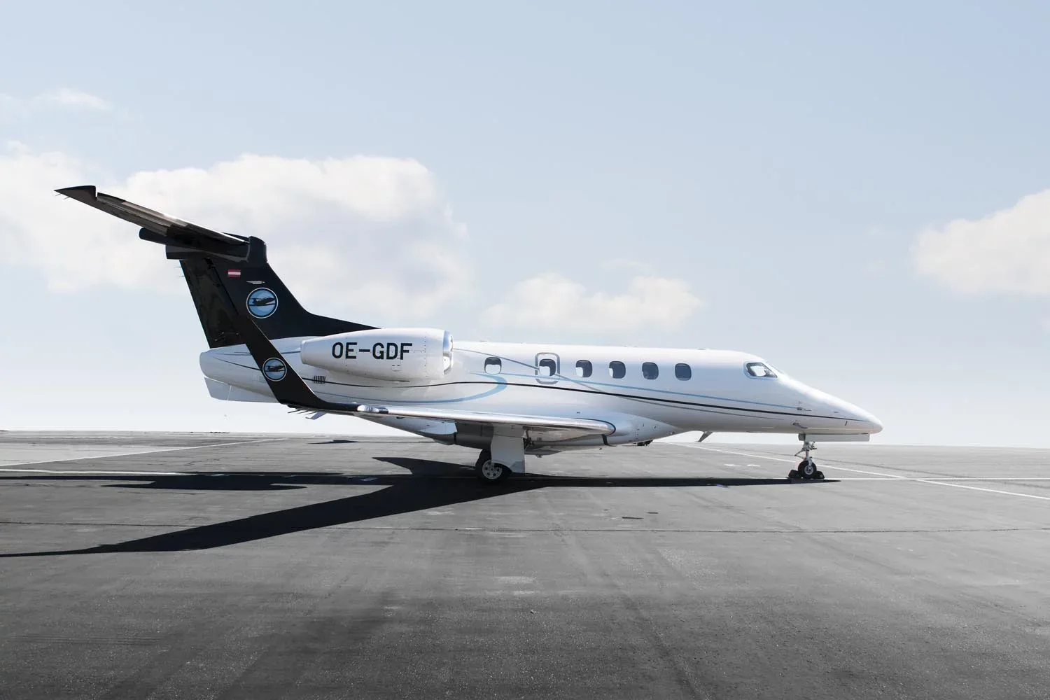 Exterior view of a Embraer Phenom 300 –, OE-GDF.