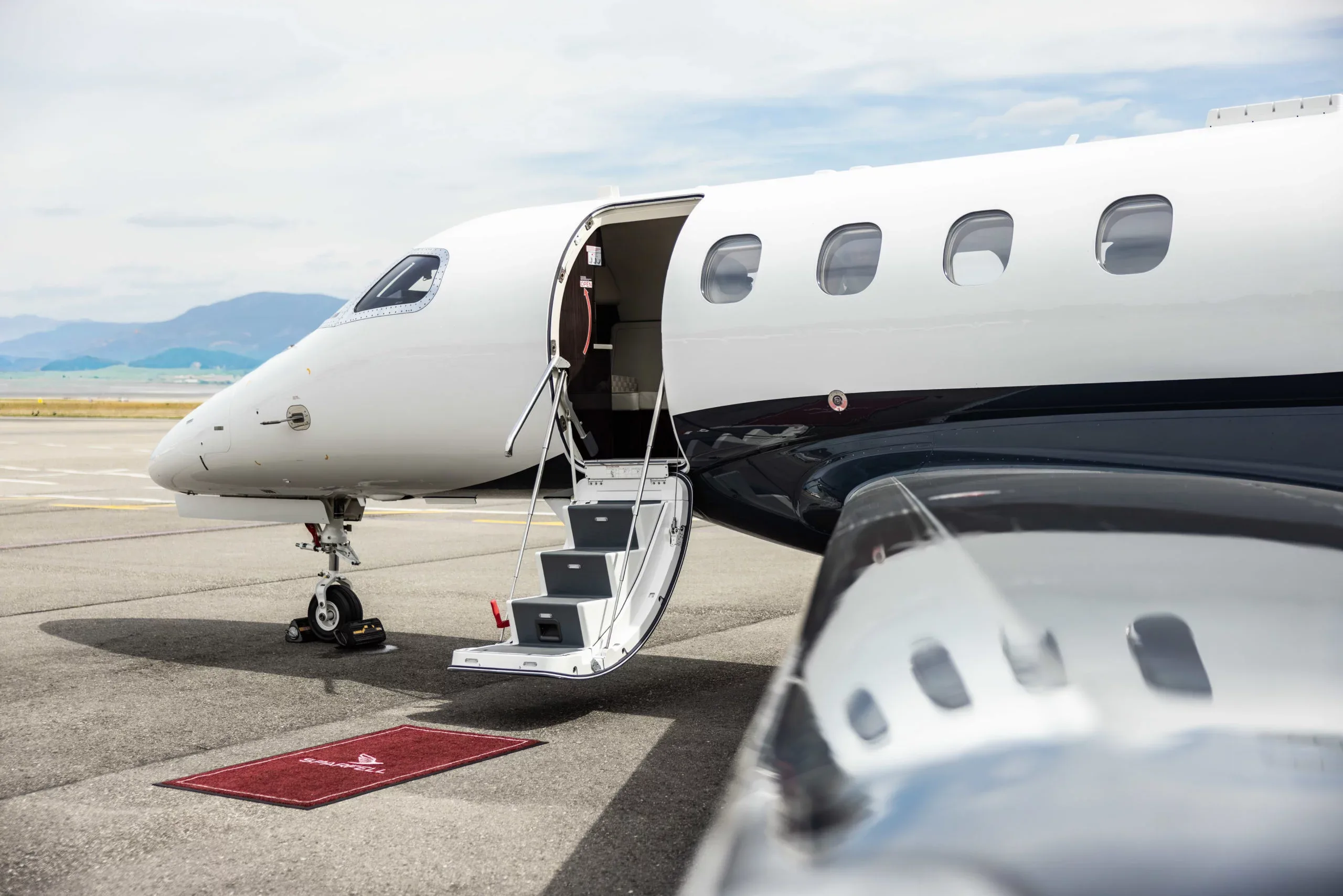 Exterior view of a 2026 Embraer Phenom 300E –, OE-GDZ.