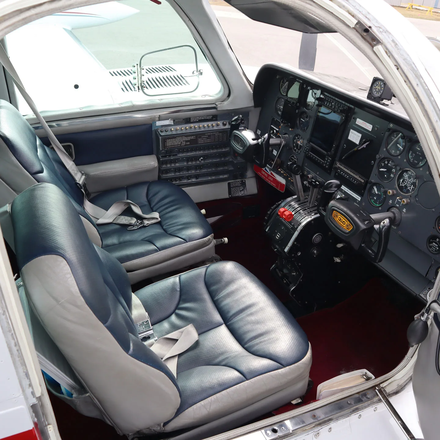 Cockpit and instrument panel of a 1977 Cessna T310R | TAS Aviation.