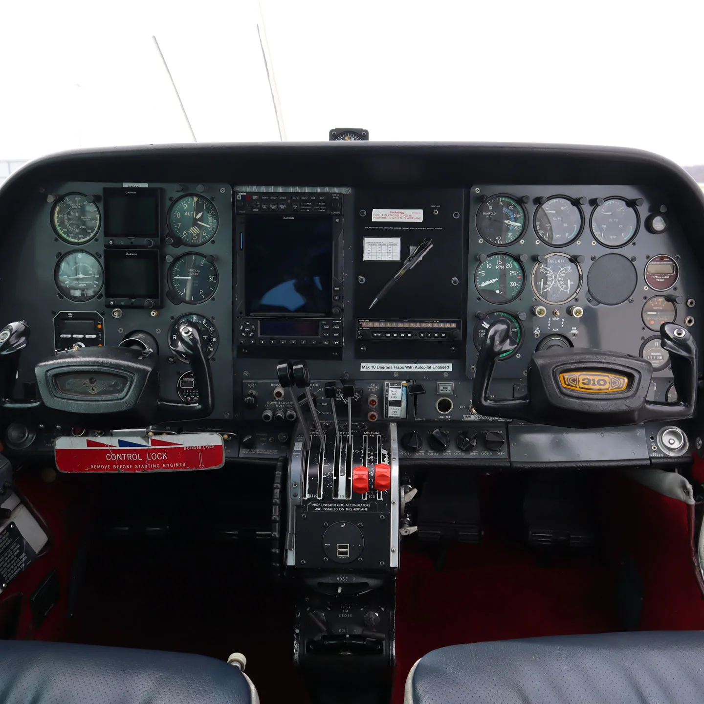 Cockpit and instrument panel of a 1977 Cessna T310R | TAS Aviation.