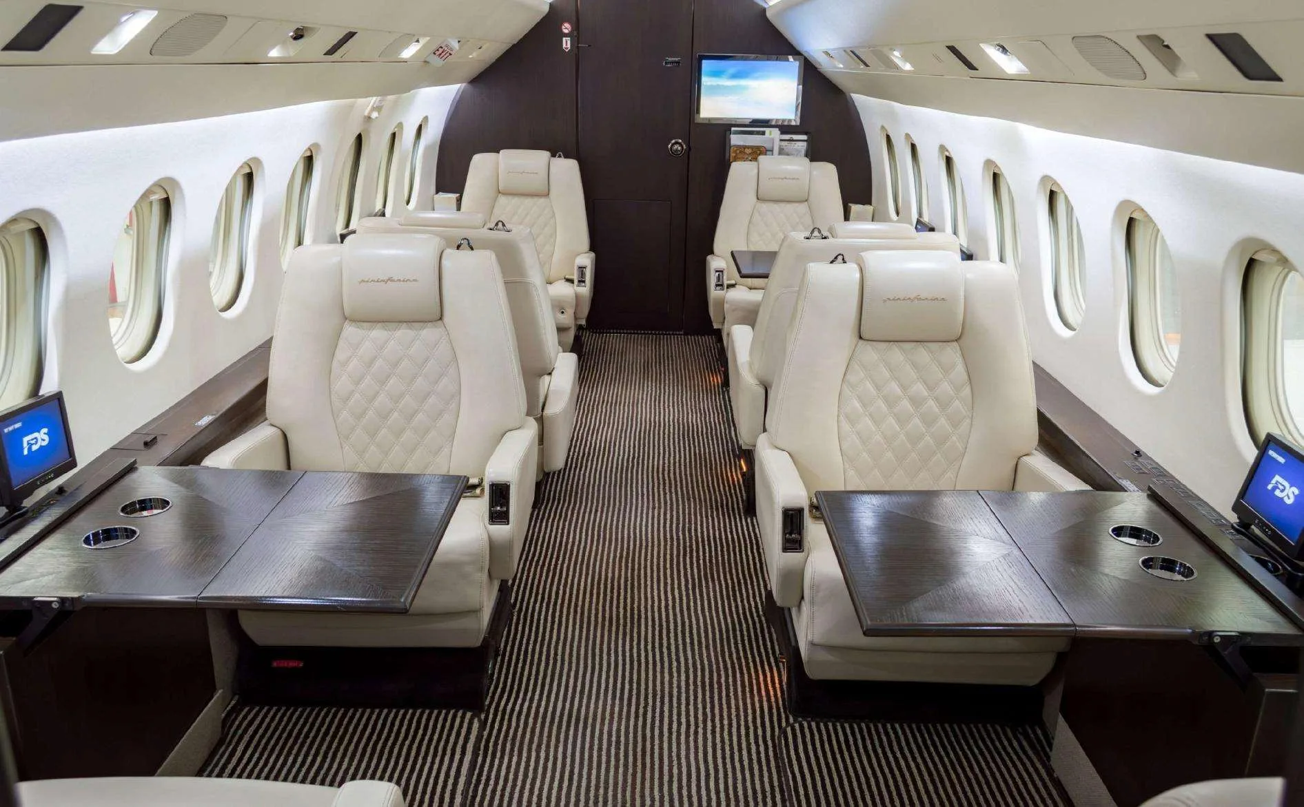 Cabin interior of a 1999 Dassault Falcon 2000.