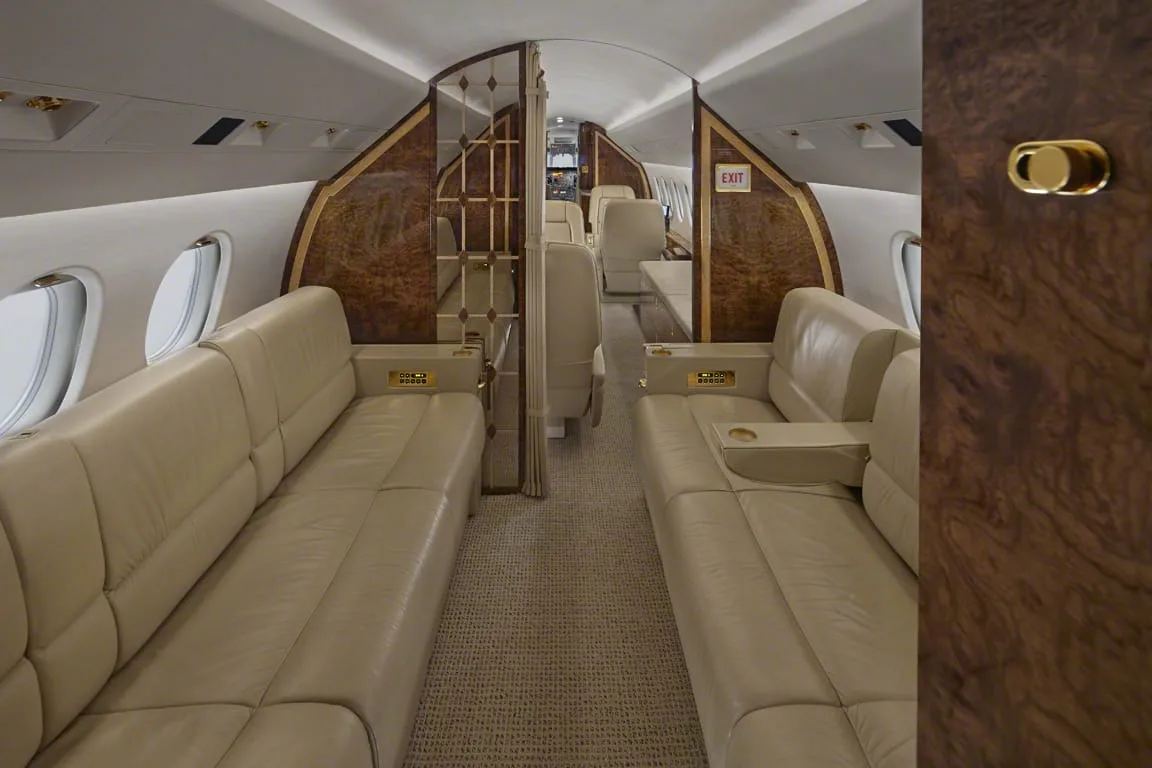Cabin interior of a 1999 Dassault Falcon 900B.
