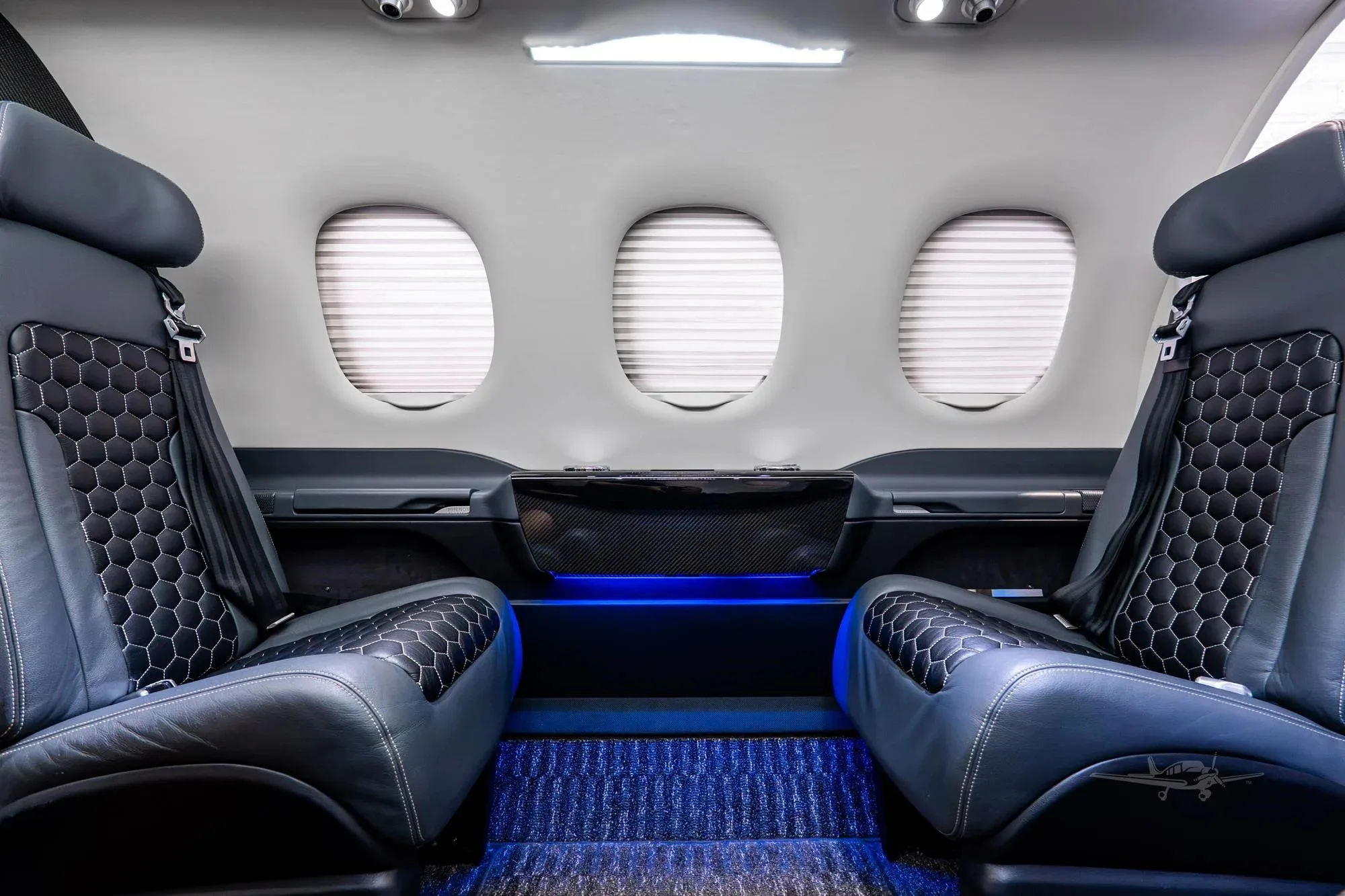 Cabin interior of a 2010 Embraer Phenom 100.