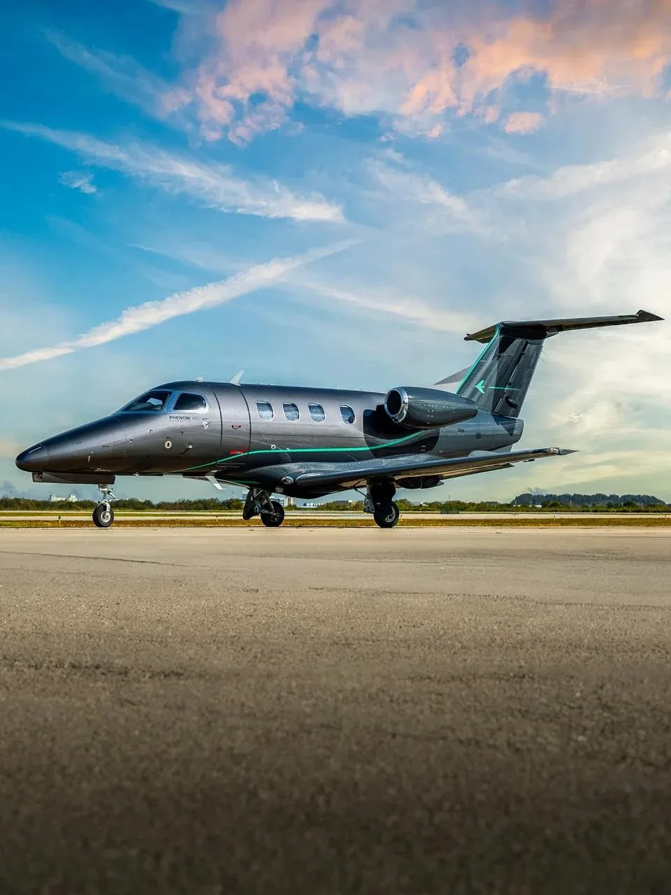 Exterior view of a 2010 Embraer Phenom 100.