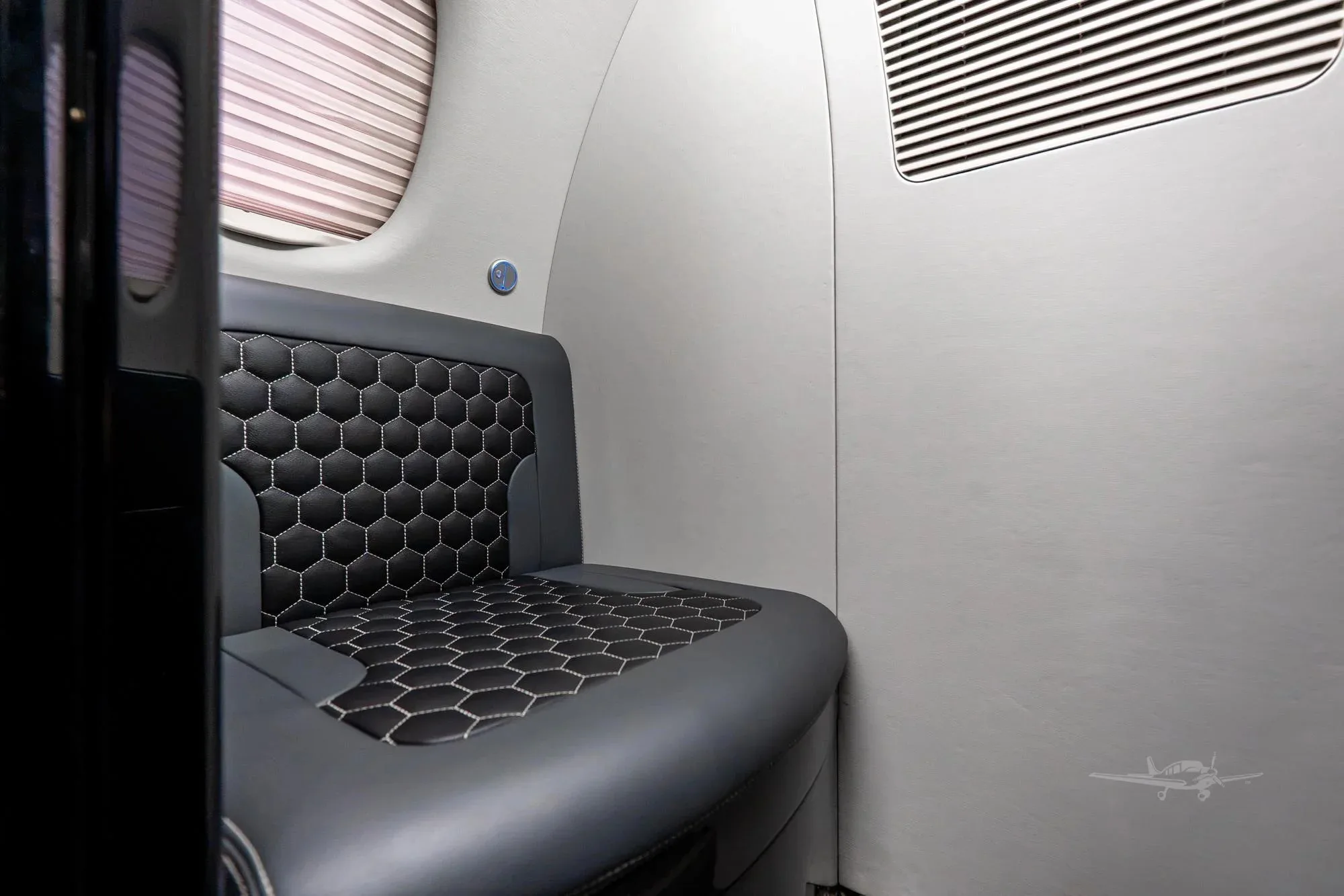 Cabin interior of a 2010 Embraer Phenom 100.