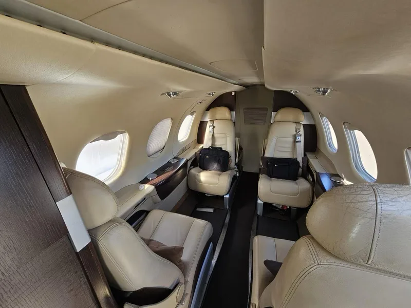 Cabin interior of a 2011 Embraer Phenom 100.