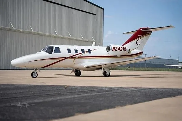 Exterior view of a 1998 Cessna CitationJet, N242RF.
