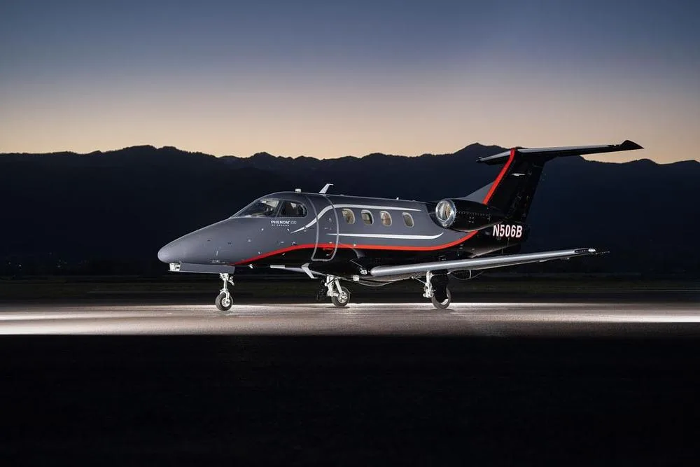 Exterior view of a 2013 Embraer Phenom 100.