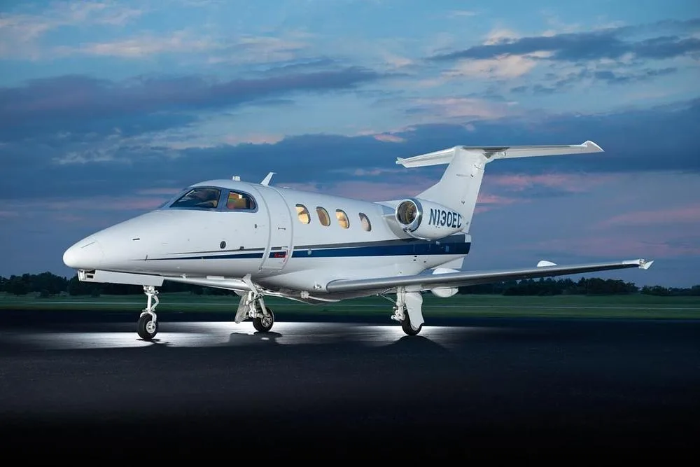 Exterior view of a 2010 Embraer Phenom 100, N130EC.