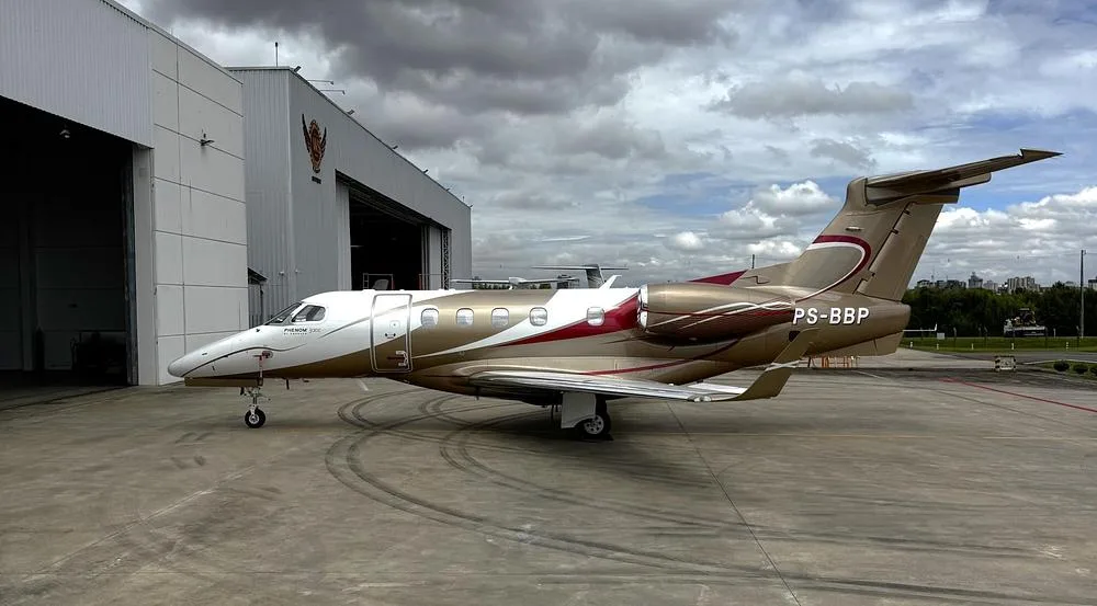 Exterior view of a 2018 Embraer Phenom 300, PS-BBP.