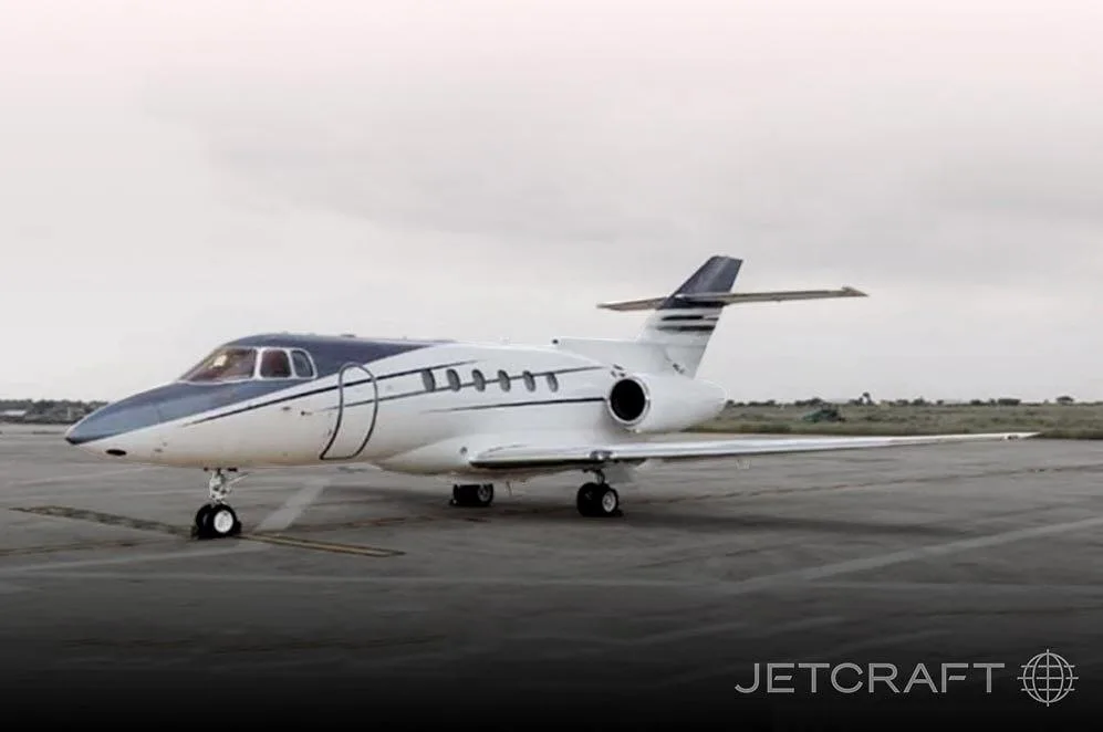 Exterior view of a 2006 Hawker 800XPI, VT-POP.