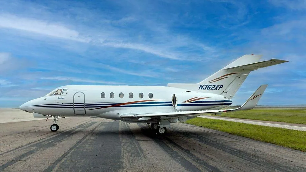 Exterior view of a 2010 Hawker 900XP, N362XP.