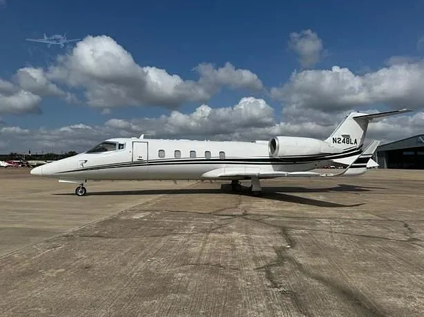 Exterior view of a 2002 Learjet 60XR, N248LA.