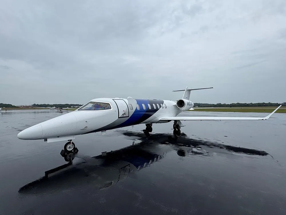 Exterior view of a 2017 Learjet 75, N12JS.
