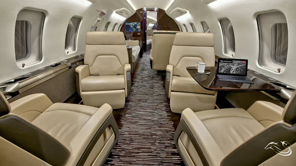 Cabin interior of a 2017 Bombardier Challenger 650 | One US Owner | Large Cabin — Thoroughbred Aviation.