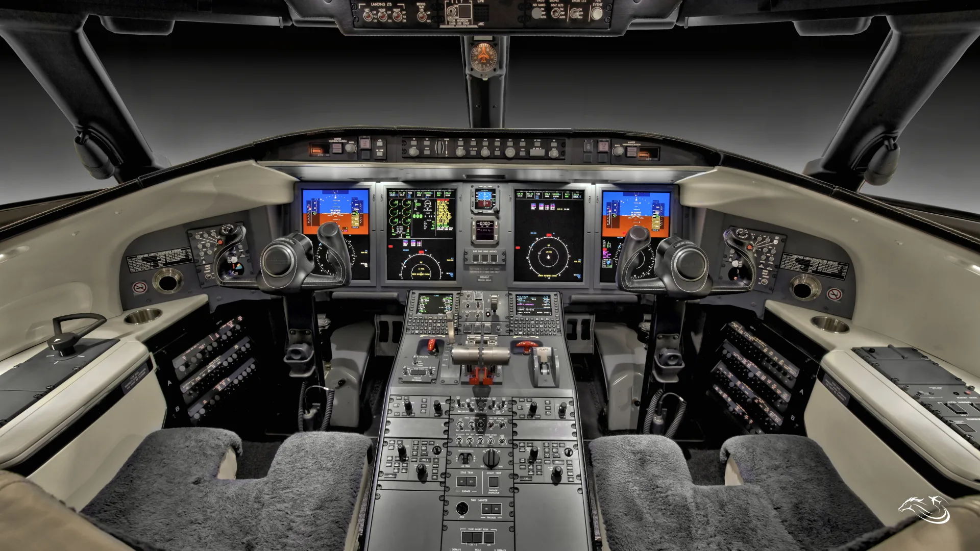 Cockpit and instrument panel of a 2017 Bombardier Challenger 650 | One US Owner | Large Cabin — Thoroughbred Aviation.