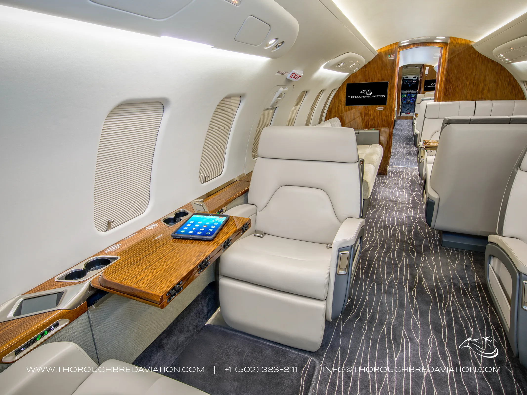 Cabin interior of a 2018 Bombardier Challenger 650 — Thoroughbred Aviation.